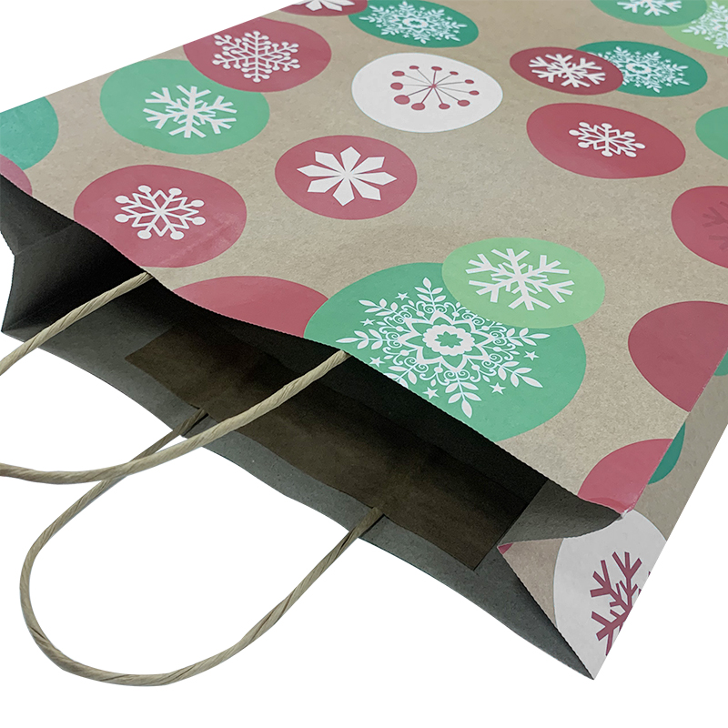 حقيبة ورقية كرافت ملونة من ليباك آرت لعيد الميلاد مع الشعار