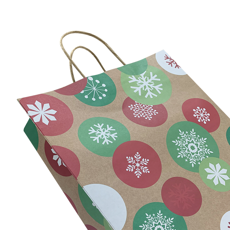 حقيبة ورقية كرافت ملونة من ليباك آرت لعيد الميلاد مع الشعار